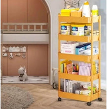 Yellow 5-tier plastic storage trolley with open shelves and caster wheels, partially filled