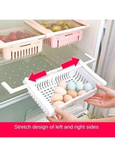 Expandable refrigerator organizer bin with divider and vented sides, adjustable stretch design