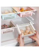 Set of refrigerator organizer bins with divider, vented plastic compartments for eggs and produce