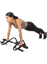 Steel push-up bars set with soft sponge grips, black handles on the floor