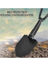 Folding engineer shovel with black spade blade, serrated edge, and locking hinge.