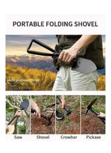 Portable folding shovel with black spade blade and folding handle, held by hand.