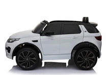 White electric ride-on SUV side view with black wheels and roof