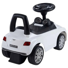 White ride-on push car with steering wheel, padded seat, and rear lights