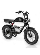 Black electric fat-tire bike with front headlight, rear rack, and dual suspension seat.