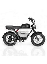 Black electric fat-tire bike with headlight, rear cargo rack, and front suspension fork.