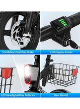 Electric bike front wheel and fork with dual disc brakes, LED display, and basket.