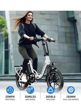 Electric scooter with rider, white frame, front suspension fork and dual disc brakes