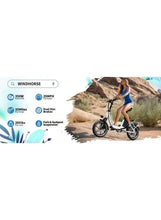 Electric scooter with rider, white frame, dual disc brakes and front suspension fork