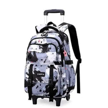 Wheeled kids backpack with black-and-white splatter print, padded front and side pockets