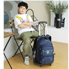 Huitich wheeled school bag for boys and girls in navy blue with multiple compartments beside a sitting child