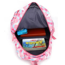 Pink kids wheeled backpack open view showing gray interior and stacked items