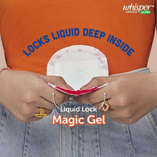 Sanitary pad with wings held over denim pants, shows liquid lock magic gel