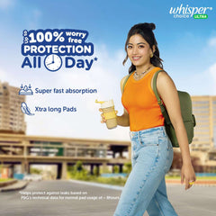 Young woman with backpack holding drink in front of Whisper Choice sanitary pads XL ad for all day protection and xtra long pads