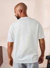 Cotton short sleeve T-shirt in white, crew neck back view.