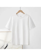 Cotton short sleeve T-shirt, white crew neck, hanging front view.