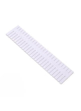 White grid drawer separator organizer with vertical slots for dividing drawer items.