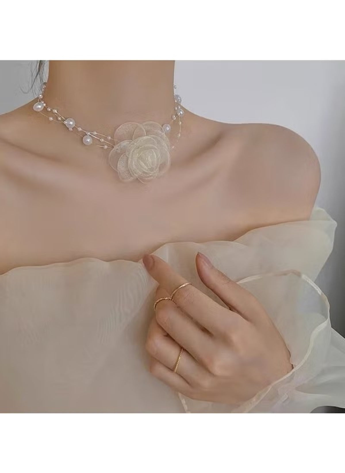 Huitich white rose choker necklace with delicate pearls and sheer floral design on model