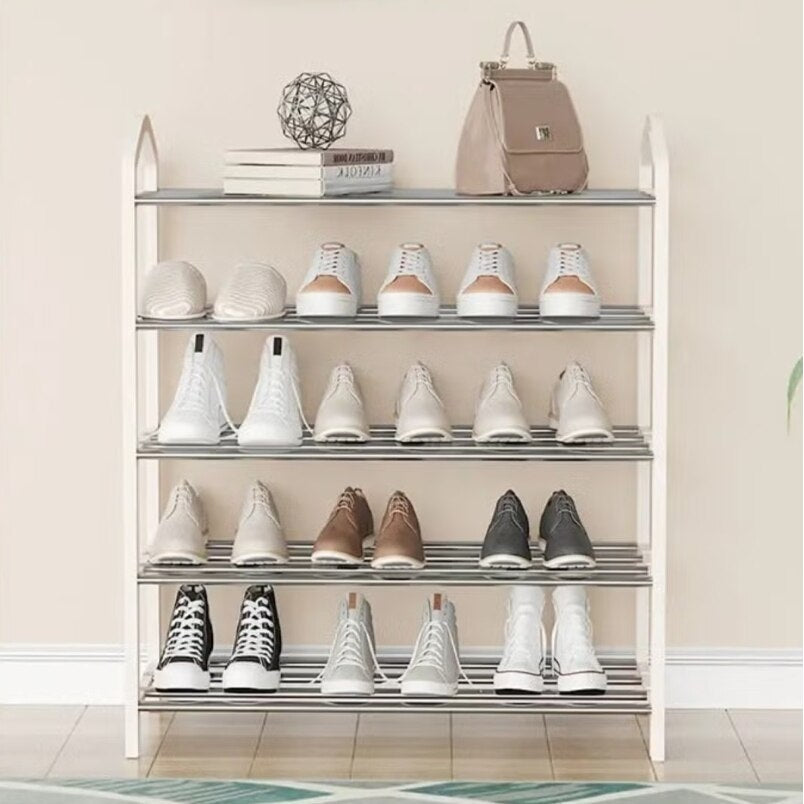 Huitich 5 tier shoe rack organizer in white holding various shoes and a handbag on top