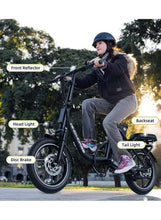 Black electric folding bike with front headlight, disc brake, and rear backseat.