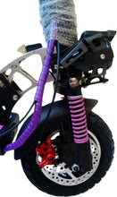 Electric scooter front wheel with purple suspension spring and black fender