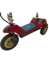 Red 3-wheel electric mobility scooter with patterned deck and front wheel