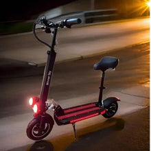 Foldable electric scooter with seat, red frame, illuminated LED deck light