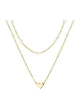 Gold-tone double-layer necklace with faux pearl beads and heart pendant