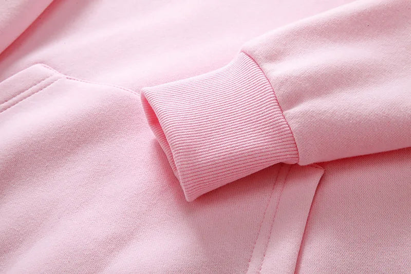 Close-up of Mumzar women's cat ear hoodie UAE showcasing soft pink fabric and ribbed cuffs