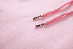 Close-up of pink drawstrings on a cozy women's cat ear hoodie UAE, perfect for a stylish look