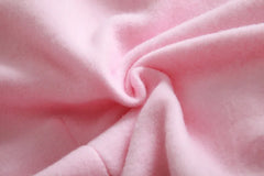 Soft pink fabric texture of a women's cat ear hoodie UAE designed for comfort and style