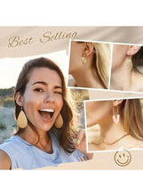 Gold-tone fashion earrings set with hoop drops and dangling charm designs