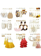 Assorted gold-tone fashion earring set with hoops, studs, and tassel dangles