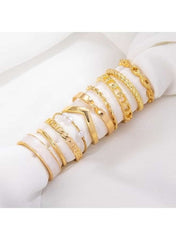 Elegant women's gold ring set featuring various styles and textures for versatile accessorizing