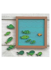 Wooden fish framed painting with green and orange fish on blue background in a wooden frame