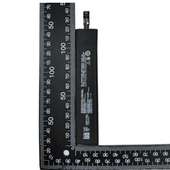 BS06FA battery for Xiaomi Black Shark 3 slim replacement battery pack shown next to measuring rulers by Mumzar