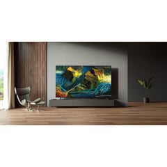 Modern living room setup with wall-mounted TV featuring Xiaomi Mi Box S 2nd Gen 4K streaming