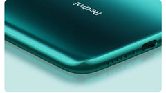 Teal green back corner closeup showing Redmi logo USB C port and speaker used Redmi Note 8 Pro for sale Mumzar