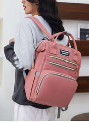 Huitich pink baby travel bag with multiple pockets and padded straps for comfort and functionality