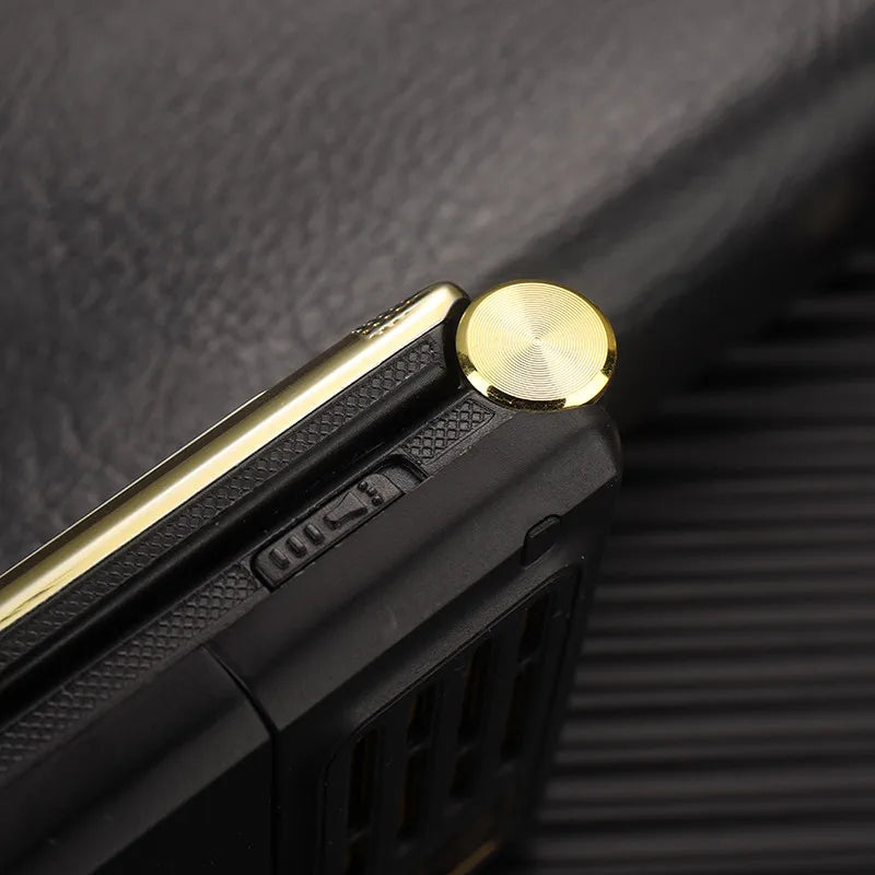Mumzar dual SIM flip phone for seniors close up showing gold hinge and textured black exterior