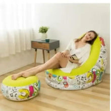 Yellow bean bag lounge chair with graffiti-pattern cover and separate ottoman