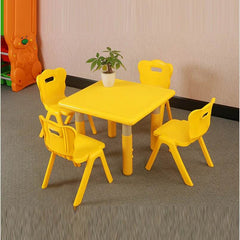 Huitich yellow indoor furniture for children study table with four matching yellow chairs and plant on top