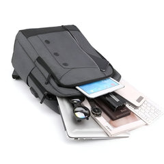 Huitich large capacity travel bag in gray holding tablet, laptop, glasses, watch, and keyboard
