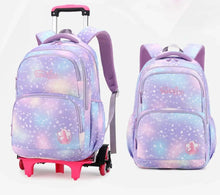 Purple galaxy trolley school bag, angled view with front zip pocket and straps
